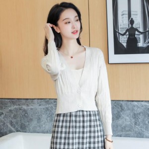 Small knitted cardigan with V-neck, long sleeve, short style, over sweater