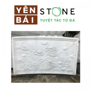 White stone lotus flower relief