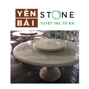 Round stone tables and chairs